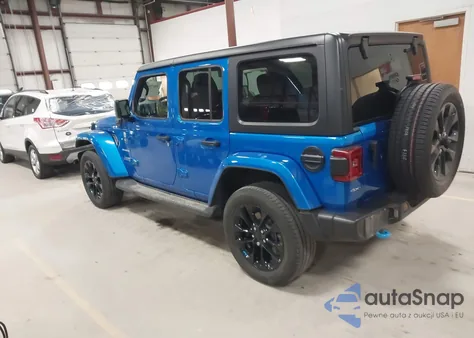 2022 Jeep Wrangler 4Xe Unlimited Sahara 4X4 z USA, uszkodzony, nr VIN 1C4JJXP65NW280491